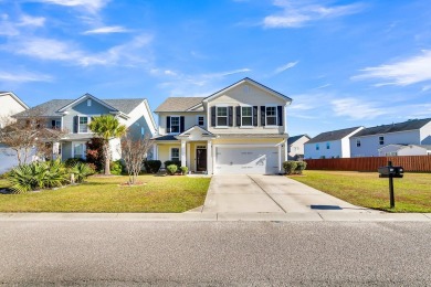 This beautiful two-story home is nestled on a pond-front lot in on Cypress Point Par 3 in South Carolina - for sale on GolfHomes.com, golf home, golf lot