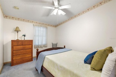 Feel Cozy in this CEDAR KEY model with BOND PAID situated in the on El Diablo Executive Golf Course in Florida - for sale on GolfHomes.com, golf home, golf lot