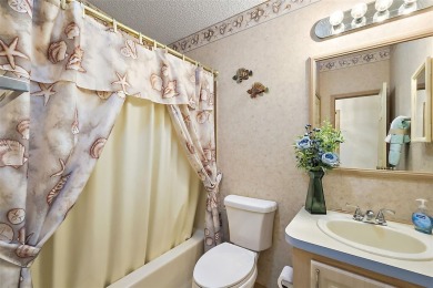 Feel Cozy in this CEDAR KEY model with BOND PAID situated in the on El Diablo Executive Golf Course in Florida - for sale on GolfHomes.com, golf home, golf lot