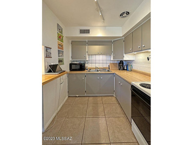 Look how pretty! Co-op located minutes from Reid Park! Updated 2 on Randolph Park Golf Courses in Arizona - for sale on GolfHomes.com, golf home, golf lot