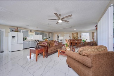 MOVE-IN READY & COMPLETELY REFURBISHED! This 2-Bed, 2-Bath home on Indian Lake Estates Golf and Country Club in Florida - for sale on GolfHomes.com, golf home, golf lot