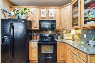Welcome to this spacious ranch-style townhome near Buffalo Run on Buffalo Run Golf Course in Colorado - for sale on GolfHomes.com, golf home, golf lot