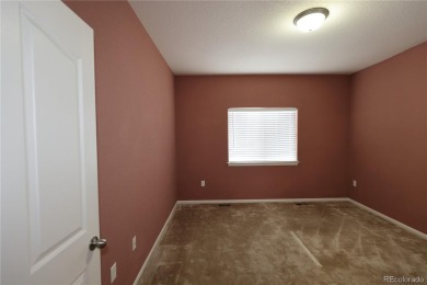 Welcome to this spacious ranch-style townhome near Buffalo Run on Buffalo Run Golf Course in Colorado - for sale on GolfHomes.com, golf home, golf lot