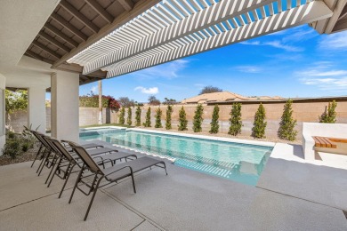 Resort-Style Living in Whitehawk - Fully Furnished Designer Pool on Palm Desert Resort Country Club in California - for sale on GolfHomes.com, golf home, golf lot