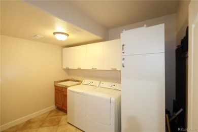 Welcome to this spacious ranch-style townhome near Buffalo Run on Buffalo Run Golf Course in Colorado - for sale on GolfHomes.com, golf home, golf lot