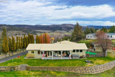 Discover the beauty of this custom built home that overlooks the on John Day Golf Club in Oregon - for sale on GolfHomes.com, golf home, golf lot