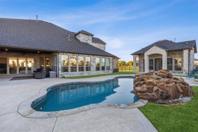 Discover your dream LAKE home on a serene cul-de-sac overlooking on Heath Golf and Yacht Club in Texas - for sale on GolfHomes.com, golf home, golf lot