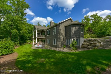 THIS IS LIVING! Stunning custom-built newer contemporary ranch on Split Rock Resort and Country Club in Pennsylvania - for sale on GolfHomes.com, golf home, golf lot