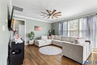 Discover this beautifully maintained 4-bedroom, 3-bath on The Westham Golf Club At Magnolia Green in Virginia - for sale on GolfHomes.com, golf home, golf lot