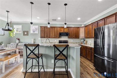 Discover this beautifully maintained 4-bedroom, 3-bath on The Westham Golf Club At Magnolia Green in Virginia - for sale on GolfHomes.com, golf home, golf lot