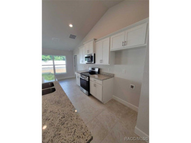 THIS HOME QUALIFIES FOR A LOW INTEREST RATE BUYDOWN WHEN BUYER on Citrus Springs Country Club in Florida - for sale on GolfHomes.com, golf home, golf lot