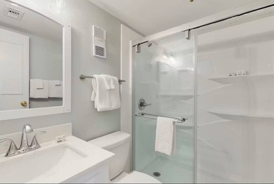 Sitting pretty on the top floor, this beautifully refreshed on Kiva Dunes Golf Club in Alabama - for sale on GolfHomes.com, golf home, golf lot