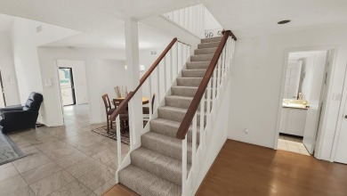Unlock the potential of this spacious three-bedroom/two and half on PGA National Golf Club in Florida - for sale on GolfHomes.com, golf home, golf lot