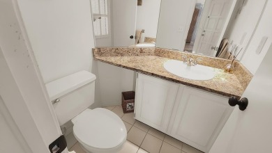 Unlock the potential of this spacious three-bedroom/two and half on PGA National Golf Club in Florida - for sale on GolfHomes.com, golf home, golf lot