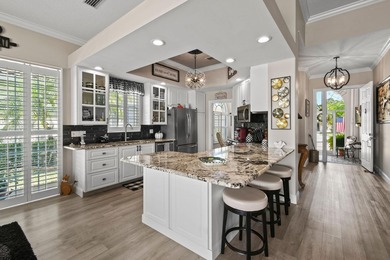 This lovely updated home offers stunning lake views, on a on Lost Lake Golf Club in Florida - for sale on GolfHomes.com, golf home, golf lot