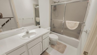 Unlock the potential of this spacious three-bedroom/two and half on PGA National Golf Club in Florida - for sale on GolfHomes.com, golf home, golf lot