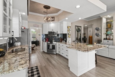 This lovely updated home offers stunning lake views, on a on Lost Lake Golf Club in Florida - for sale on GolfHomes.com, golf home, golf lot