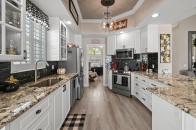 Tucked away,  In a Gated Enclave. on a quiet street, This on Lost Lake Golf Club in Florida - for sale on GolfHomes.com, golf home, golf lot