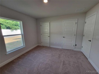THIS HOME QUALIFIES FOR A LOW INTEREST RATE BUYDOWN WHEN BUYER on Citrus Springs Country Club in Florida - for sale on GolfHomes.com, golf home, golf lot
