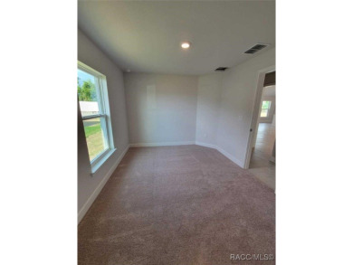 THIS HOME QUALIFIES FOR A LOW INTEREST RATE BUYDOWN WHEN BUYER on Citrus Springs Country Club in Florida - for sale on GolfHomes.com, golf home, golf lot
