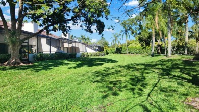 Unlock the potential of this spacious three-bedroom/two and half on PGA National Golf Club in Florida - for sale on GolfHomes.com, golf home, golf lot