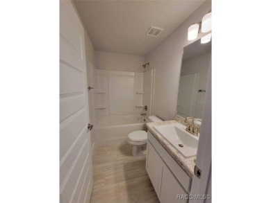 THIS HOME QUALIFIES FOR A LOW INTEREST RATE BUYDOWN WHEN BUYER on Citrus Springs Country Club in Florida - for sale on GolfHomes.com, golf home, golf lot