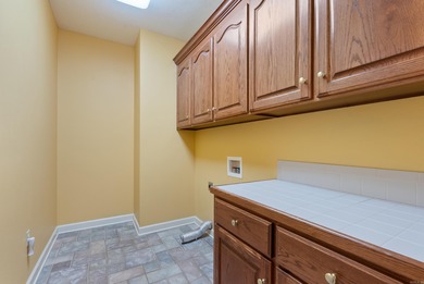 Hard to find ! Check out this 4-bedroom, 2.5-bath home close to on Centennial Valley Golf Course in Arkansas - for sale on GolfHomes.com, golf home, golf lot