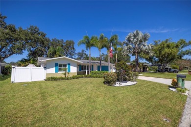 YOUR OWN PERSONAL PRIVATE PARADISE IN DELIGHTFUL DUNEDIN on The Dunedin Country Club in Florida - for sale on GolfHomes.com, golf home, golf lot