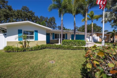 YOUR OWN PERSONAL PRIVATE PARADISE IN DELIGHTFUL DUNEDIN on The Dunedin Country Club in Florida - for sale on GolfHomes.com, golf home, golf lot