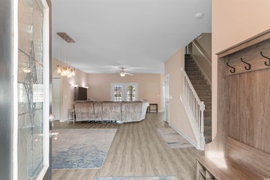 Discover the perfect blend of luxury and tranquility in this on Palmetto Greens Golf and Country Club in South Carolina - for sale on GolfHomes.com, golf home, golf lot