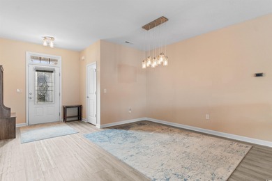 Discover the perfect blend of luxury and tranquility in this on Palmetto Greens Golf and Country Club in South Carolina - for sale on GolfHomes.com, golf home, golf lot