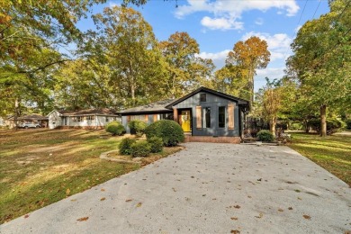 This beautiful 3-bedroom, 2-bathroom home is located just steps on Dalton Golf and Country Club in Georgia - for sale on GolfHomes.com, golf home, golf lot