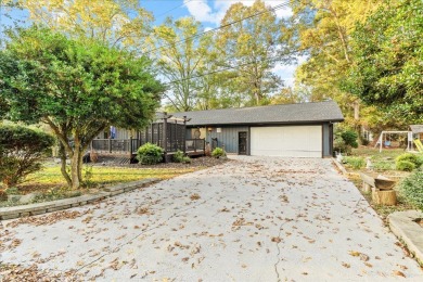 This beautiful 3-bedroom, 2-bathroom home is located just steps on Dalton Golf and Country Club in Georgia - for sale on GolfHomes.com, golf home, golf lot