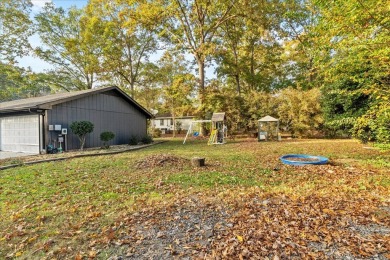 This beautiful 3-bedroom, 2-bathroom home is located just steps on Dalton Golf and Country Club in Georgia - for sale on GolfHomes.com, golf home, golf lot