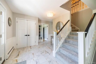 Welcome to this stunning, elegantly updated colonial nestled in on Hilltop Golf Course in Michigan - for sale on GolfHomes.com, golf home, golf lot