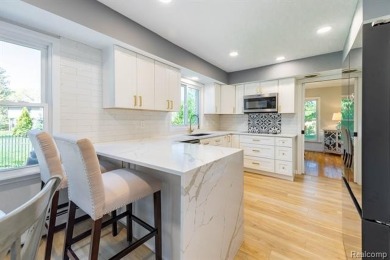 Welcome to this stunning, elegantly updated colonial nestled in on Hilltop Golf Course in Michigan - for sale on GolfHomes.com, golf home, golf lot