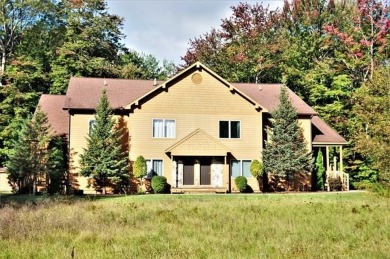 The perfect resort retreat. This spacious 3-bedroom, 3-bath on Schuss Mountain Golf Club in Michigan - for sale on GolfHomes.com, golf home, golf lot