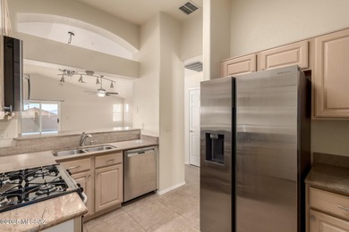 Welcome to this charming home in Qual Crossing at Dove Mountain! on Heritage Highlands At Dove Mountain in Arizona - for sale on GolfHomes.com, golf home, golf lot