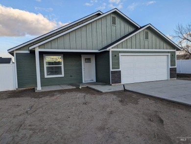 This open floor plan home is designed for an elegant and cozy on Scotch Pines Golf Course in Idaho - for sale on GolfHomes.com, golf home, golf lot