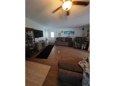 Welcome to this well-kept 2-bedroom, 2-bath home in the popular on Brookridge Country Club in Florida - for sale on GolfHomes.com, golf home, golf lot
