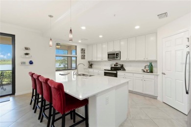 Stunning Ground-Floor Condo with Water Views in Sarasota on Sarasota National Golf Club in Florida - for sale on GolfHomes.com, golf home, golf lot