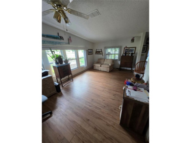 Welcome to this well-kept 2-bedroom, 2-bath home in the popular on Brookridge Country Club in Florida - for sale on GolfHomes.com, golf home, golf lot