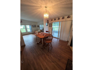 Welcome to this well-kept 2-bedroom, 2-bath home in the popular on Brookridge Country Club in Florida - for sale on GolfHomes.com, golf home, golf lot
