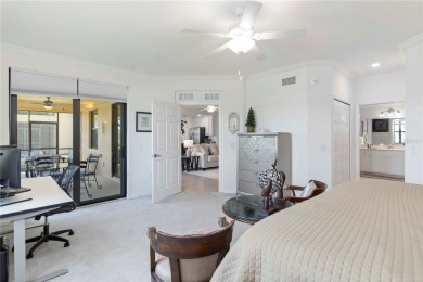 Stunning Ground-Floor Condo with Water Views in Sarasota on Sarasota National Golf Club in Florida - for sale on GolfHomes.com, golf home, golf lot