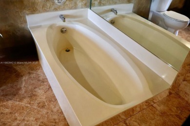WELCOME TO 17246 BOCA CLUB BLVD UNIT 102, A TIMELESS 2 BEDROOM on The Boca Country Club in Florida - for sale on GolfHomes.com, golf home, golf lot