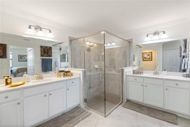 Stunning Ground-Floor Condo with Water Views in Sarasota on Sarasota National Golf Club in Florida - for sale on GolfHomes.com, golf home, golf lot