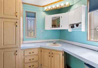 Welcome to this well-kept 2-bedroom, 2-bath home in the popular on Brookridge Country Club in Florida - for sale on GolfHomes.com, golf home, golf lot