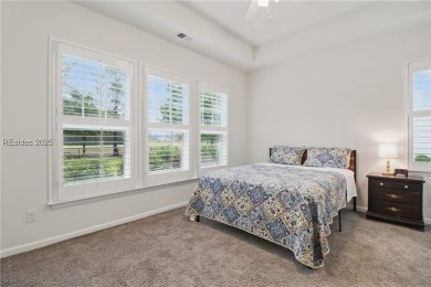 This beautifully maintained 3-bed, 2-bath home with a heated on Hilton Head Lakes Golf Club in South Carolina - for sale on GolfHomes.com, golf home, golf lot