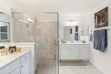 Stunning Ground-Floor Condo with Water Views in Sarasota on Sarasota National Golf Club in Florida - for sale on GolfHomes.com, golf home, golf lot