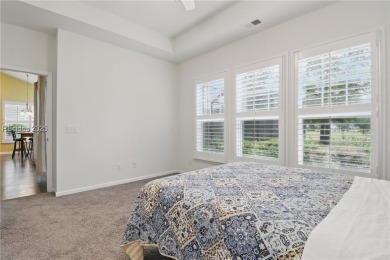 This beautifully maintained 3-bed, 2-bath home with a heated on Hilton Head Lakes Golf Club in South Carolina - for sale on GolfHomes.com, golf home, golf lot